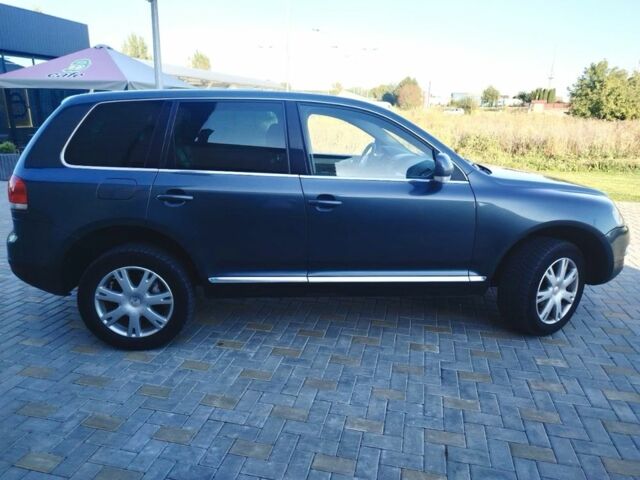 Сірий Фольксваген Туарег, об'ємом двигуна 3 л та пробігом 440 тис. км за 5900 $, фото 4 на Automoto.ua