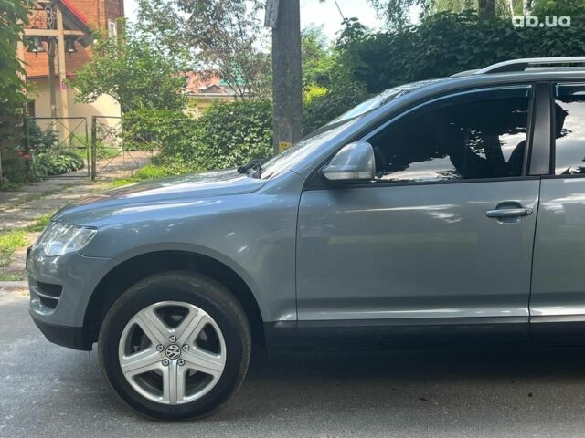 Сірий Фольксваген Туарег, об'ємом двигуна 3 л та пробігом 313 тис. км за 10990 $, фото 11 на Automoto.ua