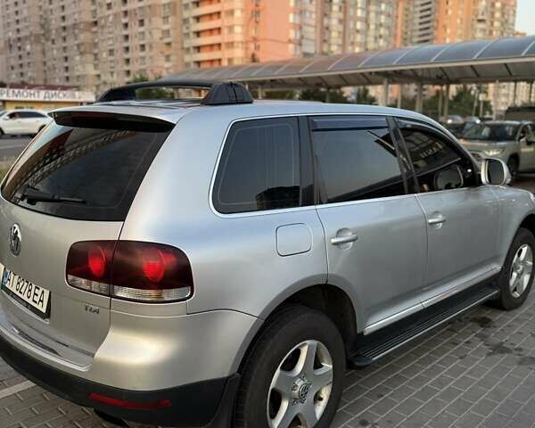 Серый Фольксваген Туарег, объемом двигателя 2.5 л и пробегом 270 тыс. км за 9900 $, фото 7 на Automoto.ua