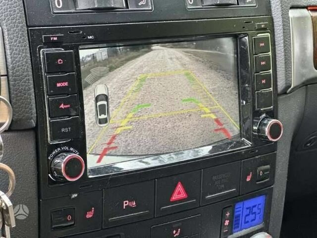 Серый Фольксваген Туарег, объемом двигателя 3 л и пробегом 391 тыс. км за 8115 $, фото 3 на Automoto.ua