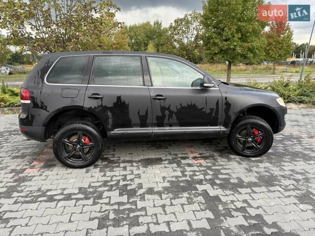 Серый Фольксваген Туарег, объемом двигателя 3 л и пробегом 230 тыс. км за 10500 $, фото 4 на Automoto.ua