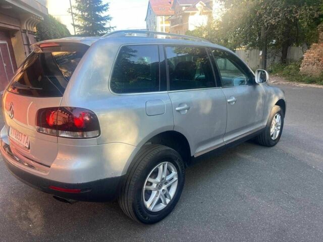 Серый Фольксваген Туарег, объемом двигателя 3 л и пробегом 355 тыс. км за 7808 $, фото 5 на Automoto.ua