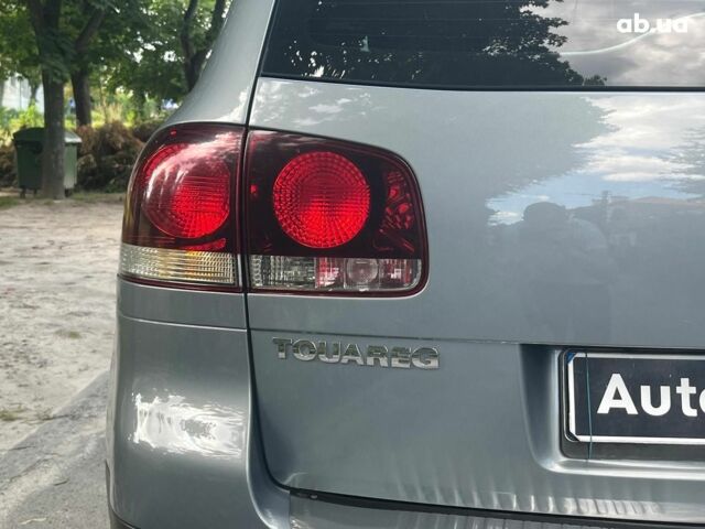 Сірий Фольксваген Туарег, об'ємом двигуна 3 л та пробігом 313 тис. км за 10990 $, фото 9 на Automoto.ua