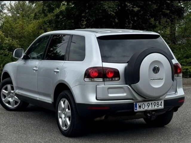 Серый Фольксваген Туарег, объемом двигателя 3 л и пробегом 219 тыс. км за 3700 $, фото 2 на Automoto.ua