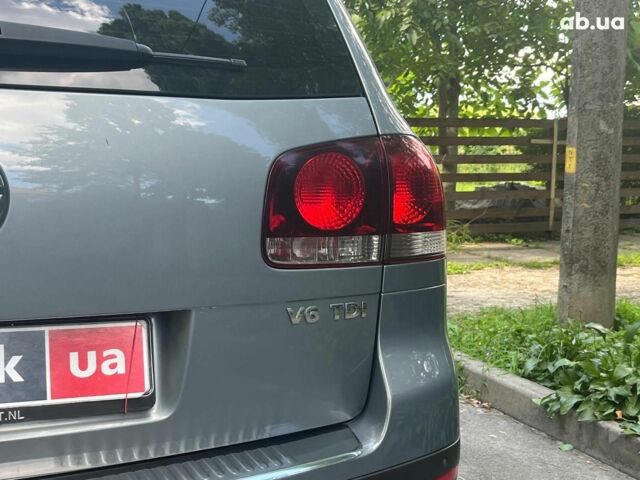 Сірий Фольксваген Туарег, об'ємом двигуна 3 л та пробігом 313 тис. км за 10990 $, фото 8 на Automoto.ua