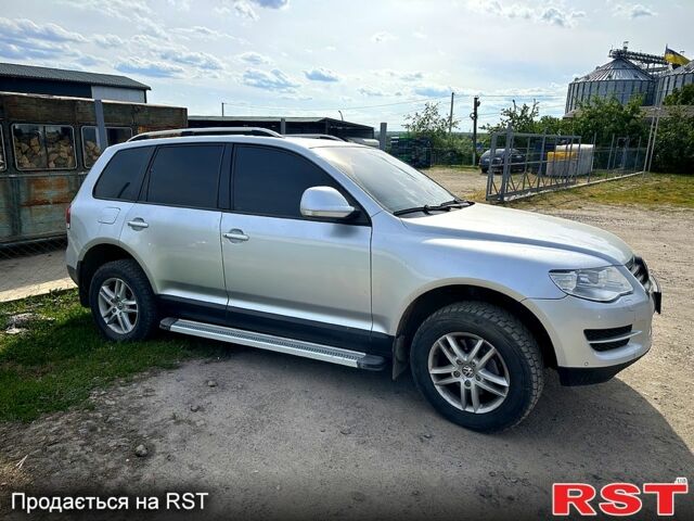 Фольксваген Туарег 2007 у Жмеренке на Automoto.ua Сірий Фольксваген Туарег, об'ємом двигуна 3 л та пробігом 244 тис. км за 10700 $, фото 7 на Automoto.ua