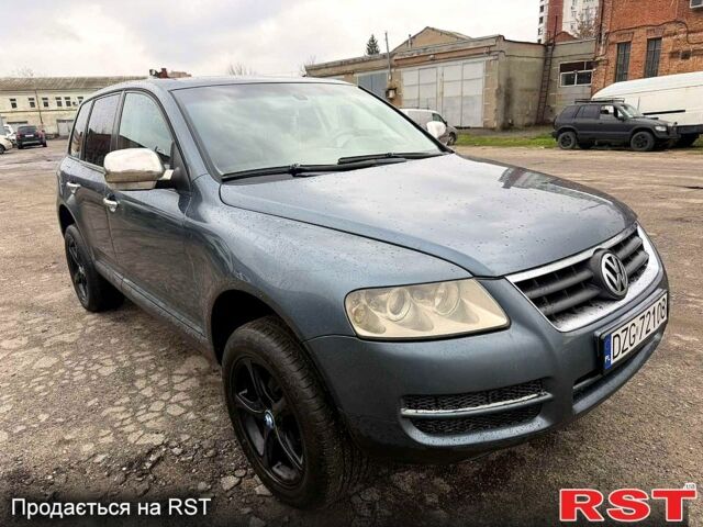 Серый Фольксваген Туарег, объемом двигателя 2.5 л и пробегом 248 тыс. км за 4300 $, фото 3 на Automoto.ua