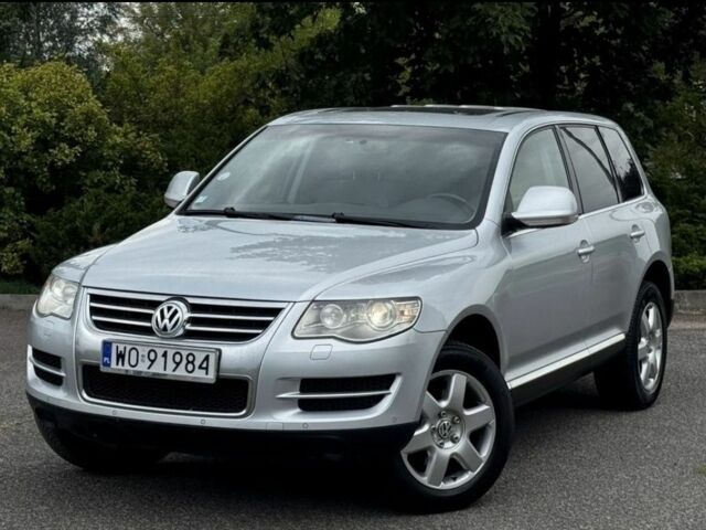 Серый Фольксваген Туарег, объемом двигателя 3 л и пробегом 219 тыс. км за 3700 $, фото 1 на Automoto.ua