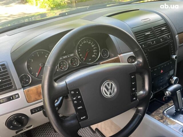 Сірий Фольксваген Туарег, об'ємом двигуна 3 л та пробігом 313 тис. км за 10990 $, фото 30 на Automoto.ua