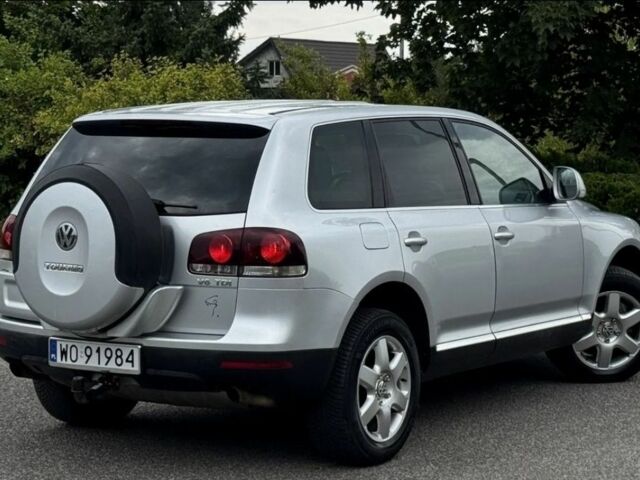 Серый Фольксваген Туарег, объемом двигателя 3 л и пробегом 219 тыс. км за 3700 $, фото 5 на Automoto.ua