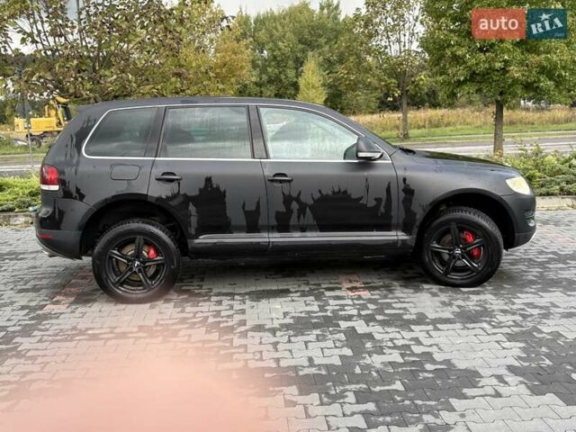 Серый Фольксваген Туарег, объемом двигателя 3 л и пробегом 230 тыс. км за 10500 $, фото 2 на Automoto.ua