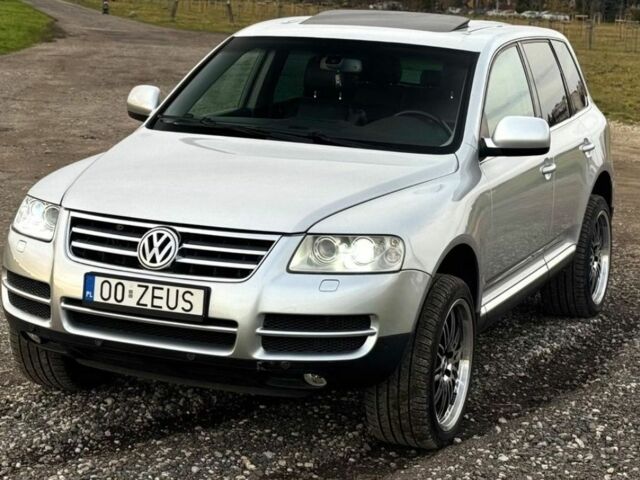 Серый Фольксваген Туарег, объемом двигателя 3 л и пробегом 219 тыс. км за 4400 $, фото 2 на Automoto.ua