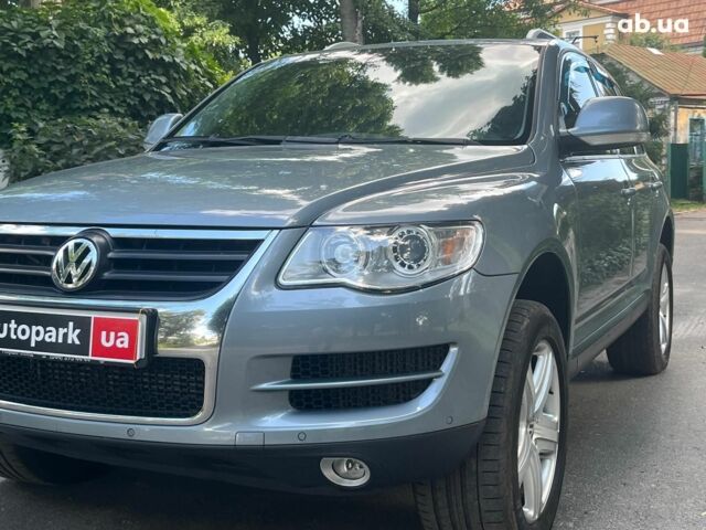 Сірий Фольксваген Туарег, об'ємом двигуна 3 л та пробігом 313 тис. км за 10990 $, фото 1 на Automoto.ua