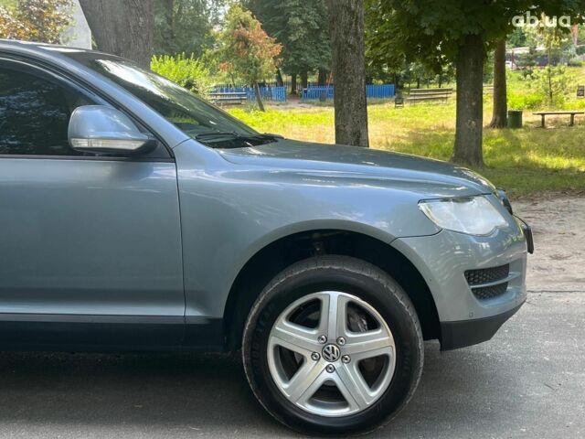Сірий Фольксваген Туарег, об'ємом двигуна 3 л та пробігом 313 тис. км за 10990 $, фото 4 на Automoto.ua