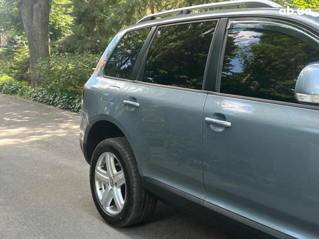 Сірий Фольксваген Туарег, об'ємом двигуна 3 л та пробігом 313 тис. км за 10990 $, фото 5 на Automoto.ua