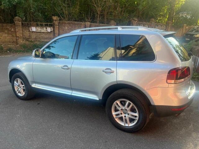 Серый Фольксваген Туарег, объемом двигателя 3 л и пробегом 355 тыс. км за 7808 $, фото 7 на Automoto.ua