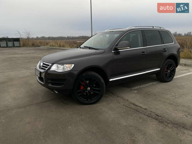 Сірий Фольксваген Туарег, об'ємом двигуна 3 л та пробігом 264 тис. км за 13200 $, фото 1 на Automoto.ua