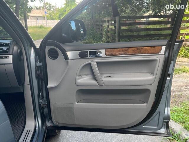 Сірий Фольксваген Туарег, об'ємом двигуна 3 л та пробігом 313 тис. км за 10990 $, фото 16 на Automoto.ua