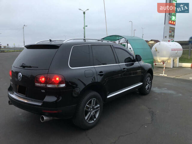 Серый Фольксваген Туарег, объемом двигателя 3.6 л и пробегом 290 тыс. км за 12000 $, фото 17 на Automoto.ua