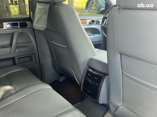 Сірий Фольксваген Туарег, об'ємом двигуна 3 л та пробігом 313 тис. км за 10990 $, фото 23 на Automoto.ua