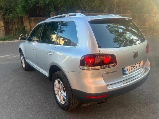 Серый Фольксваген Туарег, объемом двигателя 3 л и пробегом 355 тыс. км за 7808 $, фото 6 на Automoto.ua