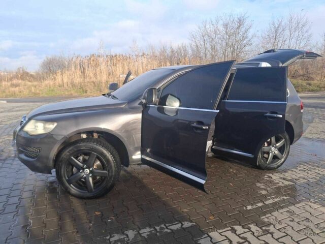 Сірий Фольксваген Туарег, об'ємом двигуна 3 л та пробігом 323 тис. км за 12700 $, фото 7 на Automoto.ua