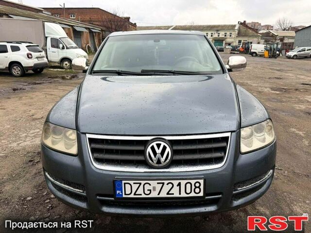 Серый Фольксваген Туарег, объемом двигателя 2.5 л и пробегом 248 тыс. км за 4300 $, фото 2 на Automoto.ua