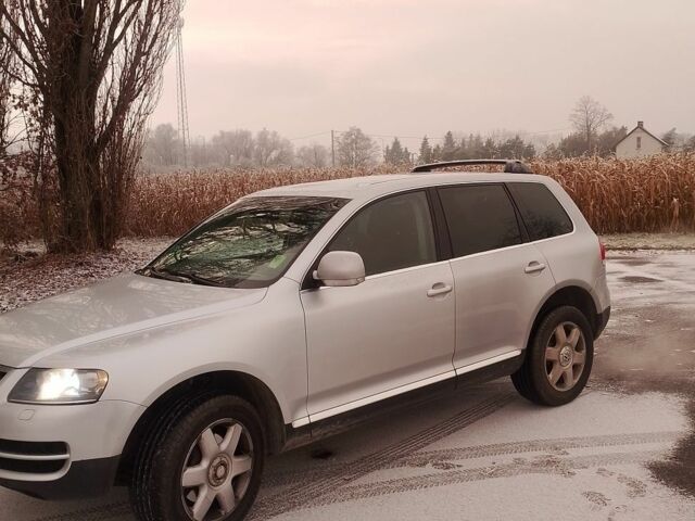 Серый Фольксваген Туарег, объемом двигателя 3 л и пробегом 224 тыс. км за 2800 $, фото 2 на Automoto.ua