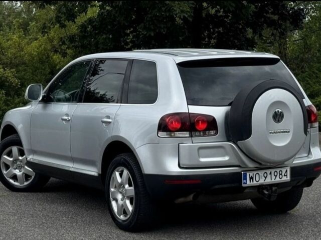 Серый Фольксваген Туарег, объемом двигателя 3 л и пробегом 219 тыс. км за 3700 $, фото 4 на Automoto.ua