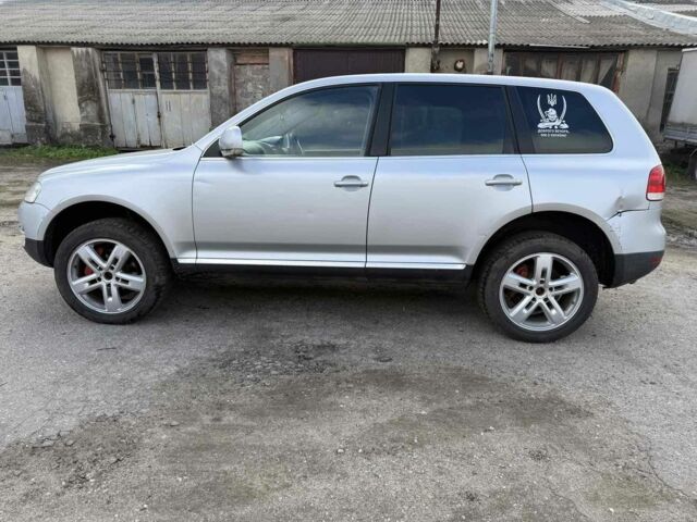 Серый Фольксваген Туарег, объемом двигателя 3 л и пробегом 289 тыс. км за 4000 $, фото 4 на Automoto.ua