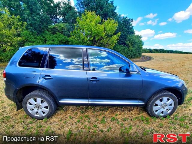 Сірий Фольксваген Туарег, об'ємом двигуна 3 л та пробігом 260 тис. км за 12000 $, фото 2 на Automoto.ua