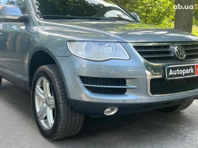 Сірий Фольксваген Туарег, об'ємом двигуна 3 л та пробігом 313 тис. км за 10990 $, фото 3 на Automoto.ua