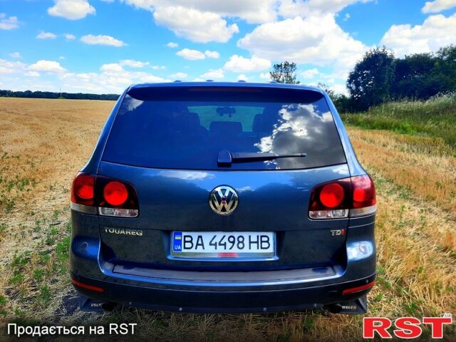 Сірий Фольксваген Туарег, об'ємом двигуна 3 л та пробігом 260 тис. км за 12000 $, фото 3 на Automoto.ua