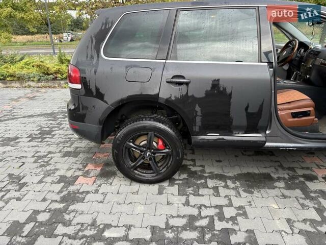 Серый Фольксваген Туарег, объемом двигателя 3 л и пробегом 230 тыс. км за 10500 $, фото 3 на Automoto.ua