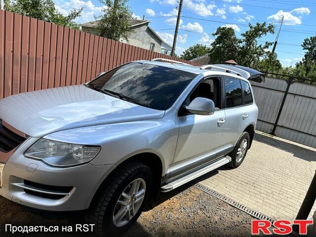 Фольксваген Туарег 2007 у Жмеренке на Automoto.ua Сірий Фольксваген Туарег, об'ємом двигуна 3 л та пробігом 244 тис. км за 10700 $, фото 6 на Automoto.ua