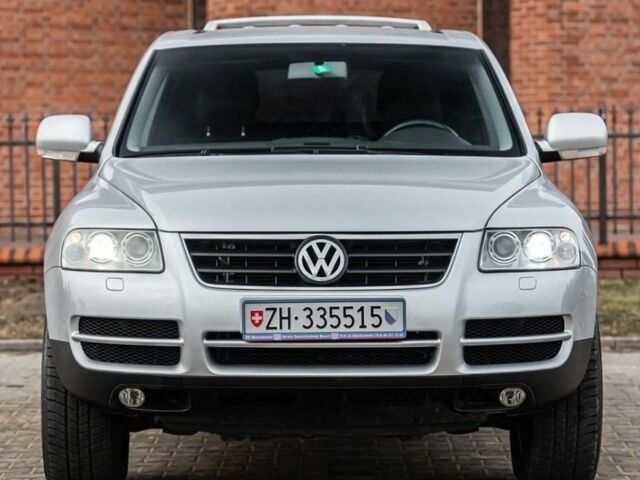 Серый Фольксваген Туарег, объемом двигателя 3 л и пробегом 252 тыс. км за 2650 $, фото 2 на Automoto.ua