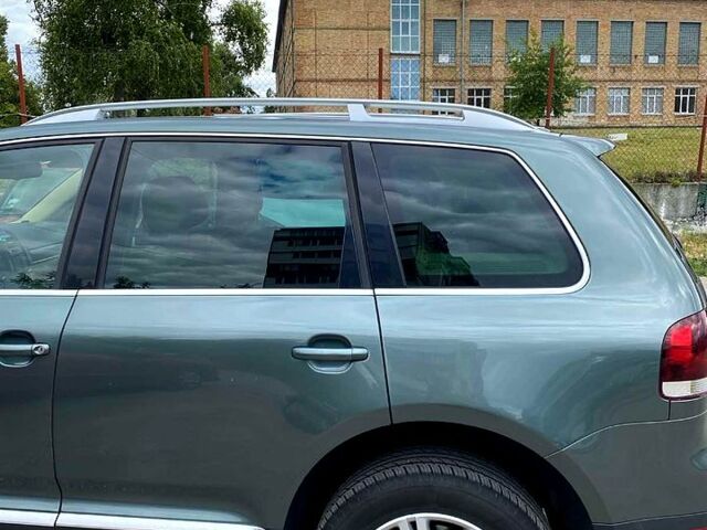 Сірий Фольксваген Туарег, об'ємом двигуна 3 л та пробігом 357 тис. км за 6800 $, фото 3 на Automoto.ua