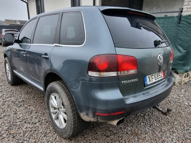 Серый Фольксваген Туарег, объемом двигателя 2.5 л и пробегом 296 тыс. км за 6200 $, фото 5 на Automoto.ua