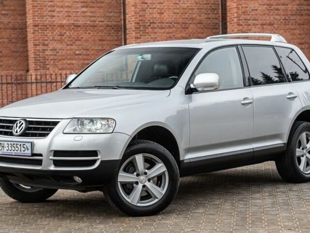 Серый Фольксваген Туарег, объемом двигателя 3 л и пробегом 252 тыс. км за 2650 $, фото 1 на Automoto.ua
