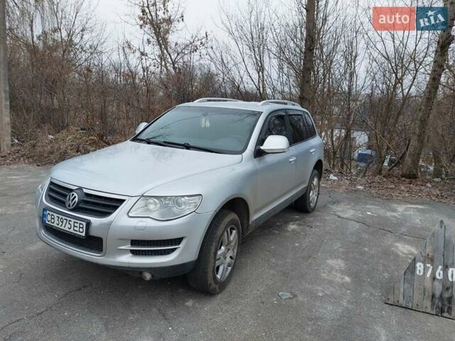 Сірий Фольксваген Туарег, об'ємом двигуна 3 л та пробігом 270 тис. км за 12500 $, фото 1 на Automoto.ua
