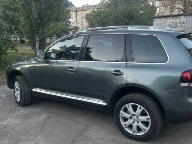 Серый Фольксваген Туарег, объемом двигателя 3 л и пробегом 362 тыс. км за 7500 $, фото 1 на Automoto.ua