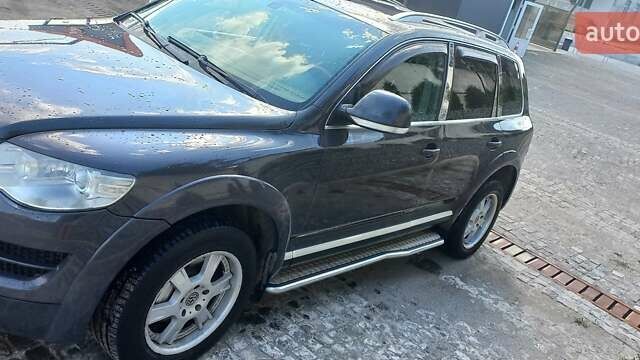 Сірий Фольксваген Туарег, об'ємом двигуна 3 л та пробігом 259 тис. км за 11734 $, фото 5 на Automoto.ua