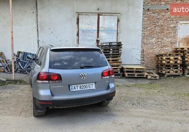 Серый Фольксваген Туарег, объемом двигателя 3 л и пробегом 322 тыс. км за 14500 $, фото 3 на Automoto.ua