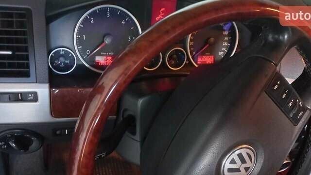 Сірий Фольксваген Туарег, об'ємом двигуна 3 л та пробігом 259 тис. км за 11734 $, фото 6 на Automoto.ua