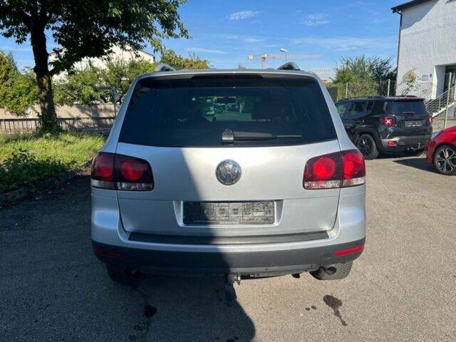 Сірий Фольксваген Туарег, об'ємом двигуна 3 л та пробігом 287 тис. км за 3321 $, фото 4 на Automoto.ua