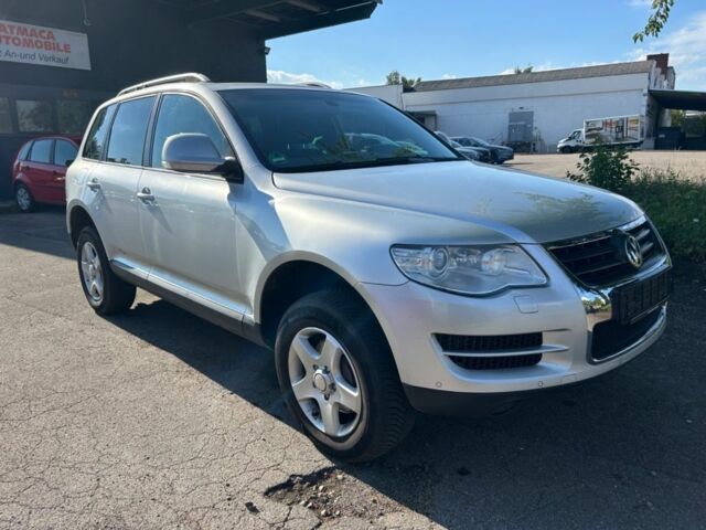 Сірий Фольксваген Туарег, об'ємом двигуна 3 л та пробігом 287 тис. км за 3321 $, фото 2 на Automoto.ua