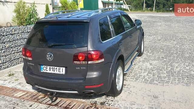 Сірий Фольксваген Туарег, об'ємом двигуна 3 л та пробігом 259 тис. км за 11734 $, фото 1 на Automoto.ua