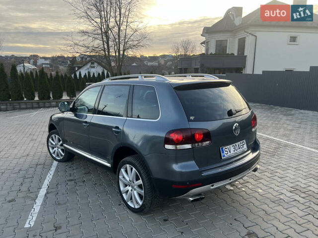 Серый Фольксваген Туарег, объемом двигателя 3 л и пробегом 260 тыс. км за 6599 $, фото 2 на Automoto.ua