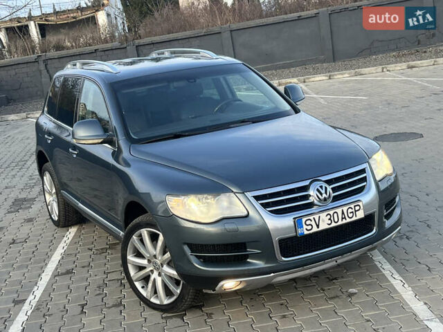 Серый Фольксваген Туарег, объемом двигателя 3 л и пробегом 260 тыс. км за 6599 $, фото 1 на Automoto.ua