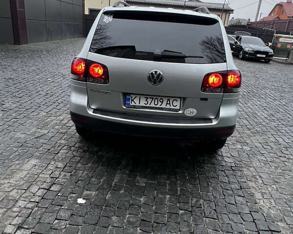 Сірий Фольксваген Туарег, об'ємом двигуна 3 л та пробігом 288 тис. км за 10700 $, фото 6 на Automoto.ua